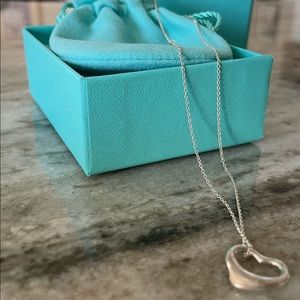 TIFFANY & CO. Open heart sterling silver “pendant of love” necklace.